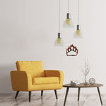 distressed-copper-bear-paw-near-yellow-chair-scaled-1