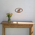 rust-elk-oval-over-table-scaled-1